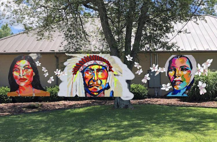 Comanche artist J. NiCole Hatfield completed a mural honoring indigenous Americans on the exterior North wall of Museum of Native American History, 202 SW O St. in Bentonville, Arkansas. The mural features Osage prima ballerina Maria Tallchief; Chief Joseph from the Nez Perce; and 