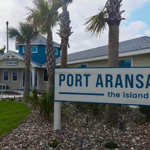 Sign reading Port Aransas the island