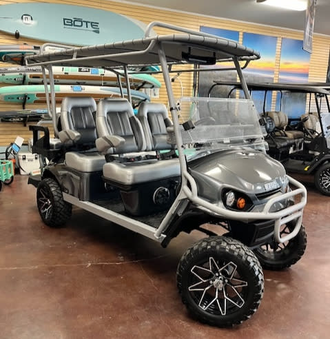 Gray six-seater golf cart in a show room