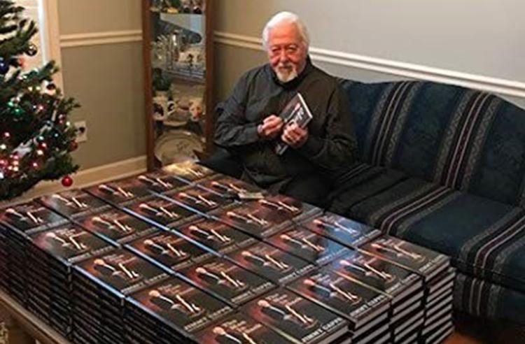 Jimmy Capps with book