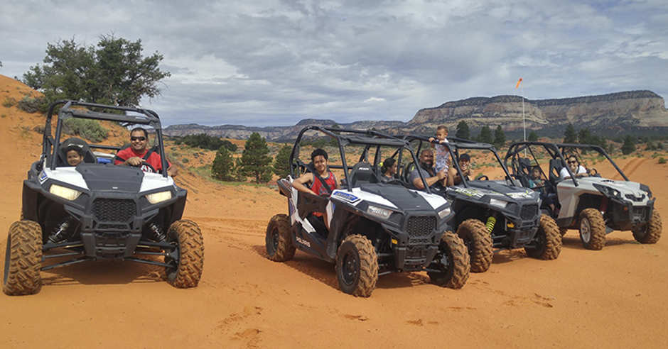 Group of people on an ATV | OHV Tour at the Coral Pink Sand Dunes near Kanab, Utah