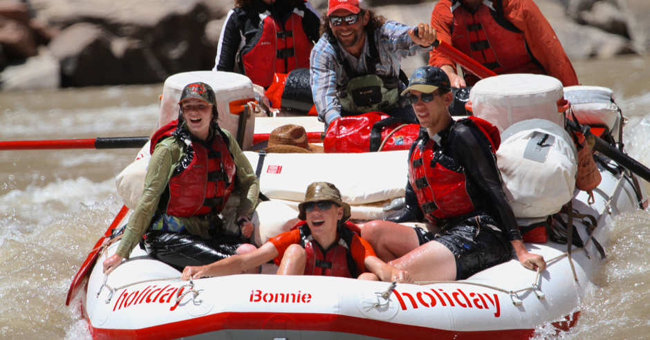 Family river rafting down Cataract Canyon with Holiday River Expeditions