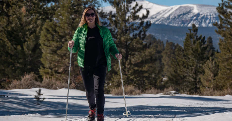 Woman Cross-Country Skiing during the Winter