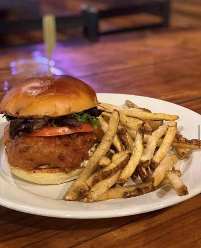 Warrior's Taphouse fired chicken sandwich and fries