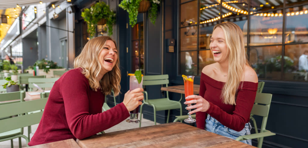 Ladies enjoying cocktails at Flight Club Cheltenham