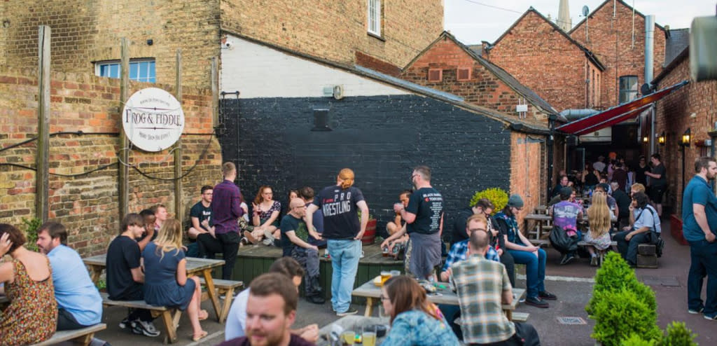 People sat outside the Frog and Fiddle, Cheltenham