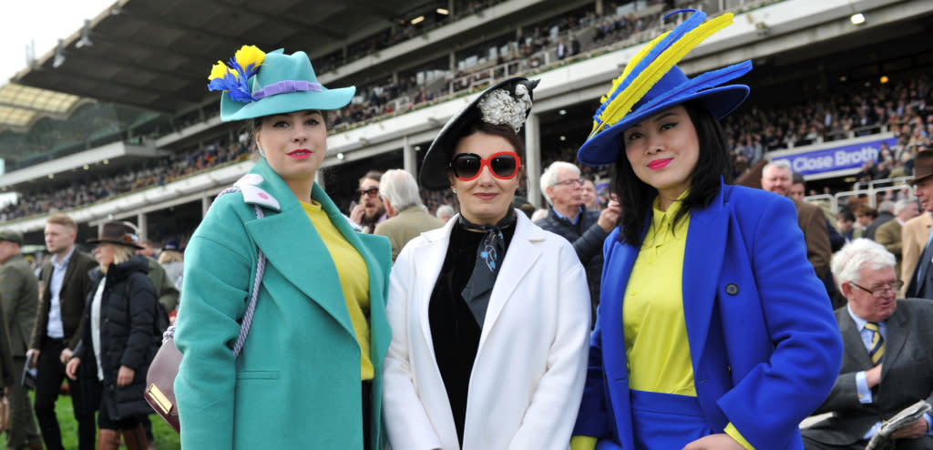 A group of fashionably dressed ladies at the Cheltenham Festival at Cheltenham Racecourse.