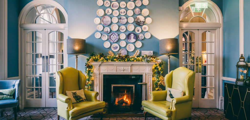 Queens Hotel Cheltenham interior with fireplace