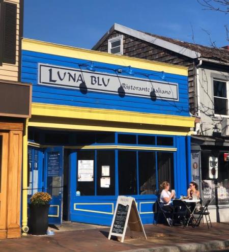 blue and bright yellow exterior of Luna Blue restaurant