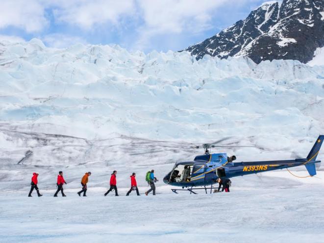 Guests Walk in Line to Heli