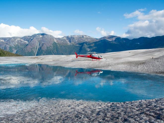 Helicopter by Glacier Melt Pool