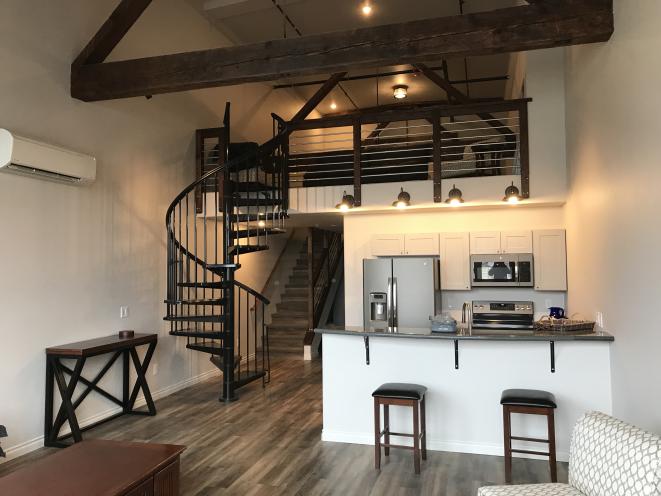 Kitchen and upstairs in loft apartment 302