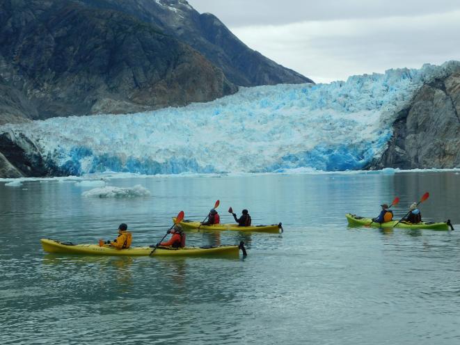 Kayaking in front of a glacier - UnCruise Adventures