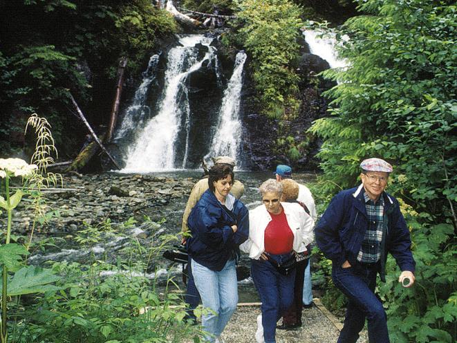 Walk to the waterfall after your meal at the Gold Creek Salmon Bake.
