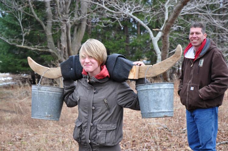 Learn how colonial Americans carried buckets full of sap during Maple Syrup Days near North Salem