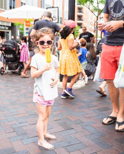 Little girl with a popsicle at the Dublin Market