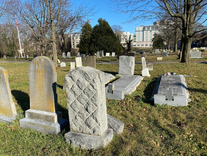 A close up of gravestones at Brewer Hill Cemetery.
