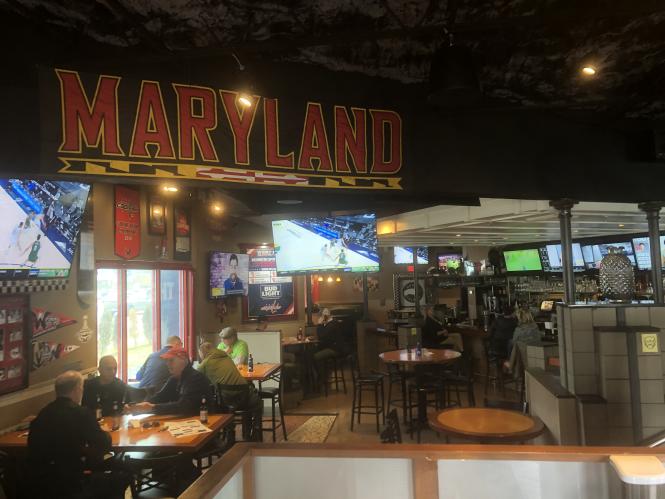 West End Grill interior has a large University of Maryland banner.