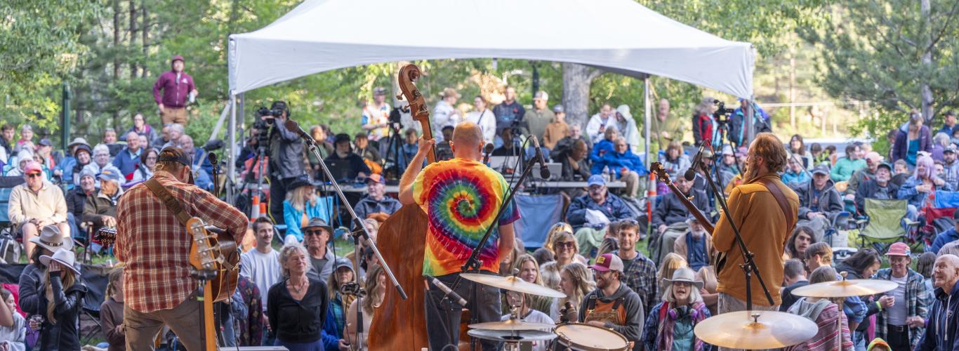 A vibrant festival crowd enjoying live music at Life is Beautiful Festival 2026