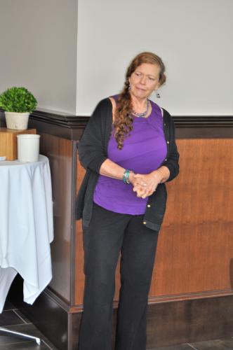 Maggie Fronk speaking to group