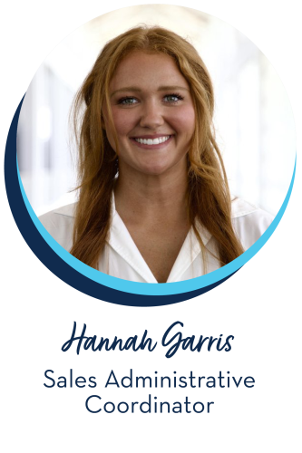 Woman with red hair and a white button down shirt, Hannah Garris Sales Administrative Coordinator