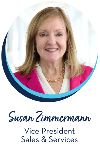 Susan Zimmermann Vice President Sales and ServicesA blonde woman wearing a bright pink blazer