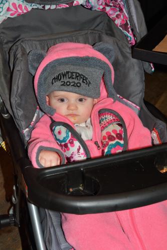 Baby wearing CF hat in stroller