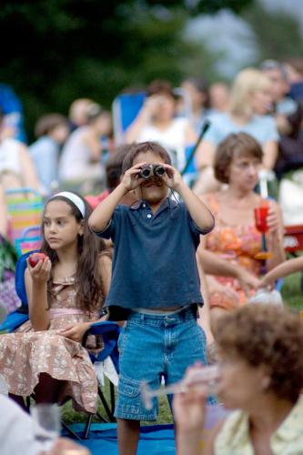Crowd and child with binoculars c Saratoga Photography Assoc