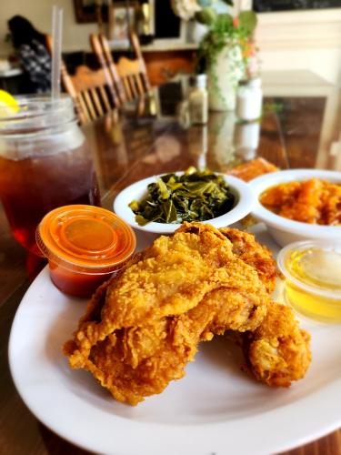 fried chicken with iced tea and collard greens at Magnolia 23