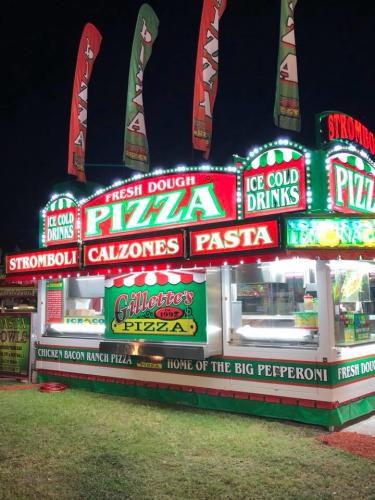 Saratoga Co. Fair pizza vendor lit up at night