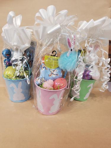 3 small filled Easter baskets with white bows