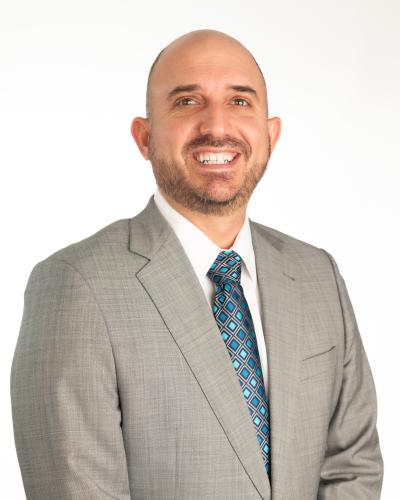 Travis Milum Headshot