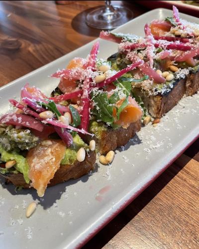 Avocado Toast North Italia with Salmon and Pickled Onions
