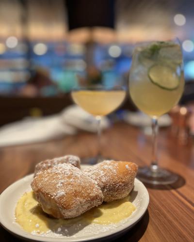 North Italia Donuts and Drinks Focused on Powdered Sugar Lemon Donuts