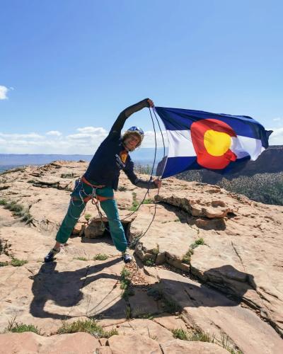 Person Holding a Colorado Flag