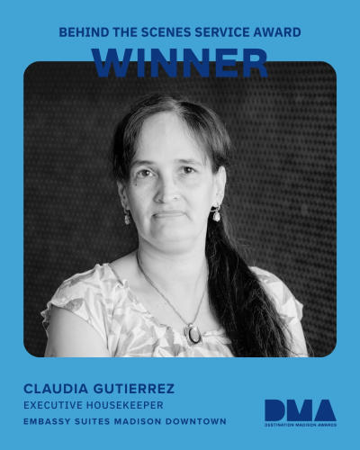 A graphic that reads "Behind the Scenes Service Award Winner, Claudia Gutierrez, Executive Housekeeper, Embassy Suites Madison Downtown" with the winners' headshot in the middle.