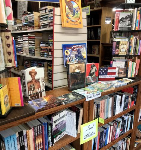 books of local authors on shelves