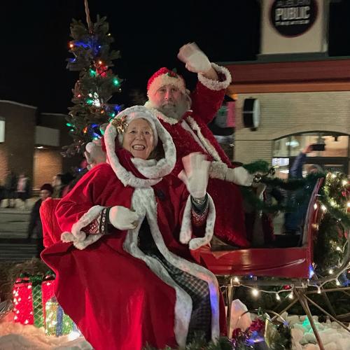 Mr and Mrs Claus waving