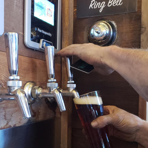 Beer poring from a tap at Accomplice Brewing Company in Cheyenne, Wyoming.