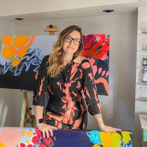 Jenna Kast infront of art