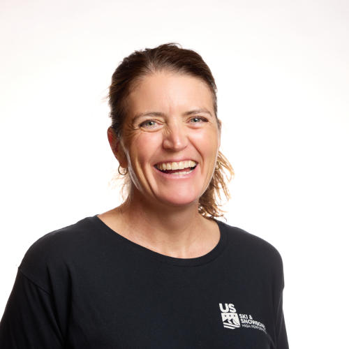 Smiling woman in black sports t-shirt