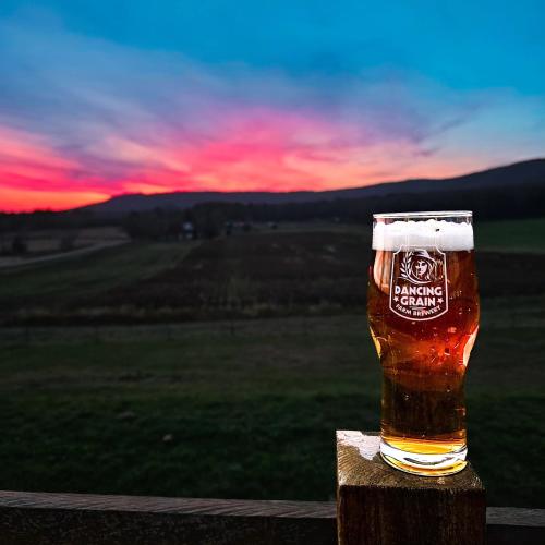 beer with sunset in background