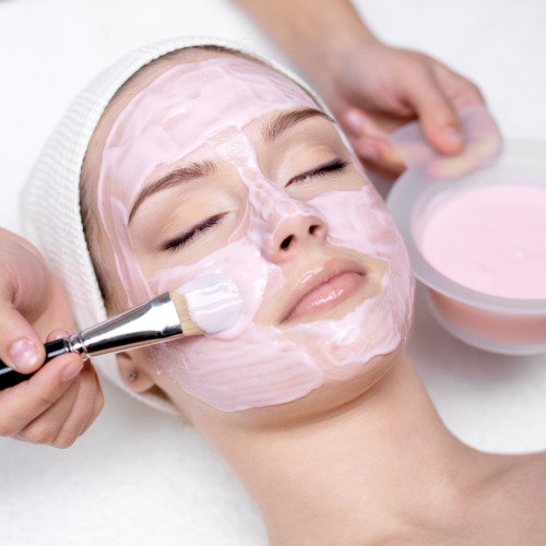 Woman with her eyes closed having a facial