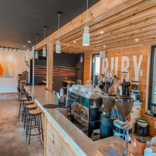 Ruby Coffee Roasters Interior with baristas behind the counter.