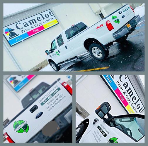 Camelot truck and sign