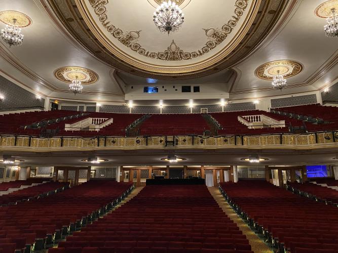 Photo of Proctors theater taken from the stage and looking out over the empty seats