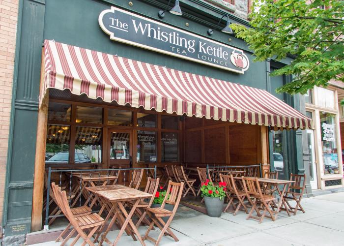 Exterior shot of The Whistling Kettle with outdoor seating in Ballston Spa, NY