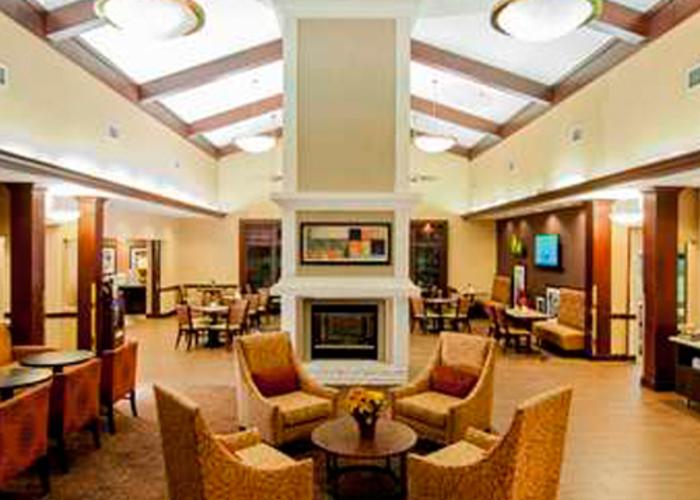 Lobby with fireplace Hampton Inn & Suites Tampa North.