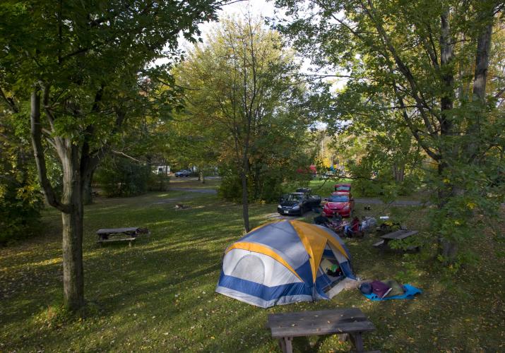 blue and yellow tent in cayuga lake state park