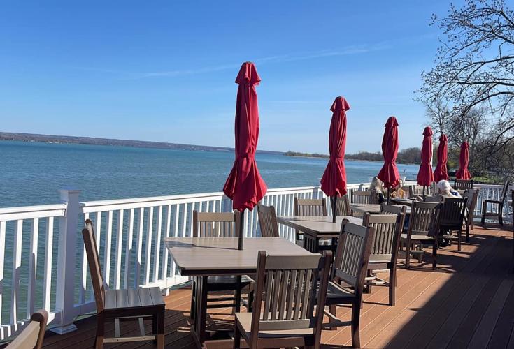 Patio dining tables overlooking cayuga lake